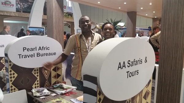 It's all smiles at the Uganda stand with Innocent and Sydah of Pearl Afric Tours and AA Safaris & Tours, respectively
