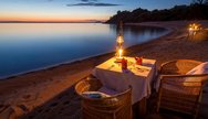 Kaya Mawa dining at the lake of stars, Lake Malawi National Park, Malawi