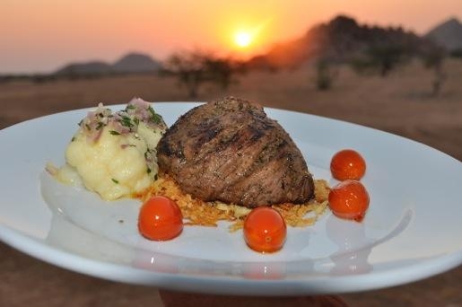 Camp Kipwe - Open Flame Grilled Fillet of Beef at sunset
