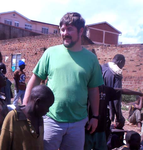 John Burns visiting a slum